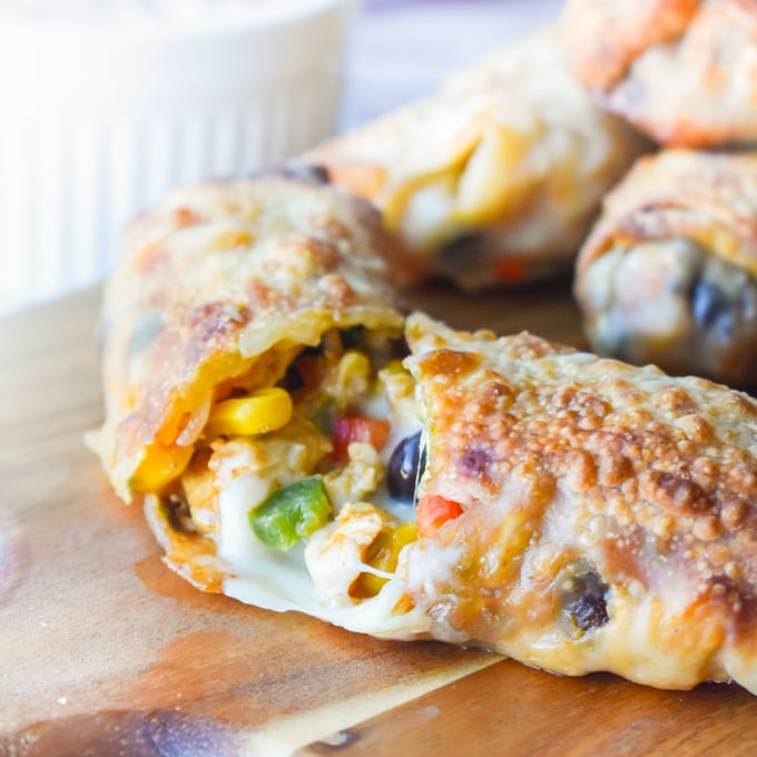 An egg roll split in half so you can see the southwest filling