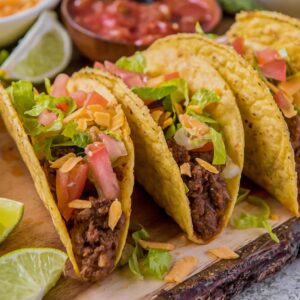 A plate of crispy ground beef tacos