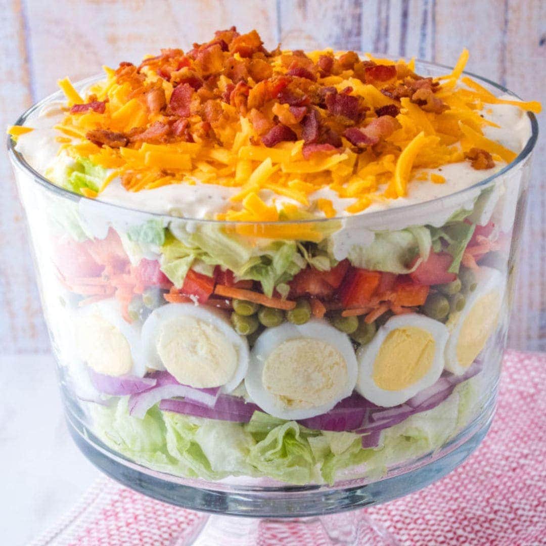 7 Layer salad in a big glass salad bowl