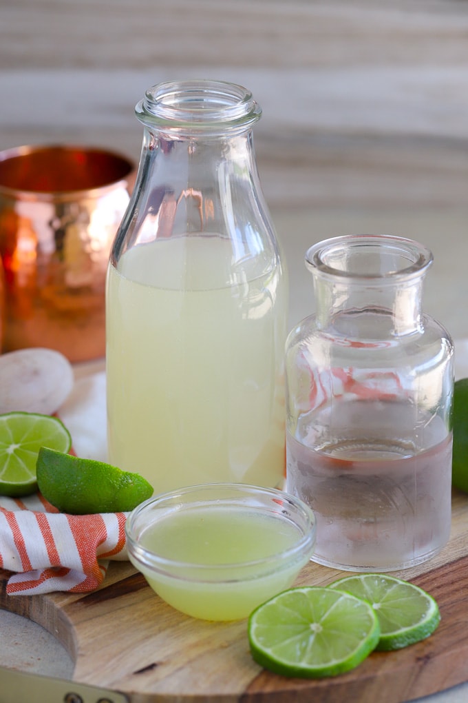 Ingredients for Moscow Mule - ginger beer, vodka, lime juice.