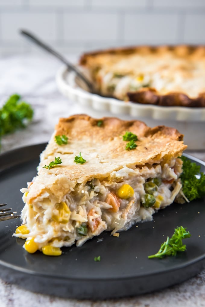 a slice of chicken pot pie on a plate