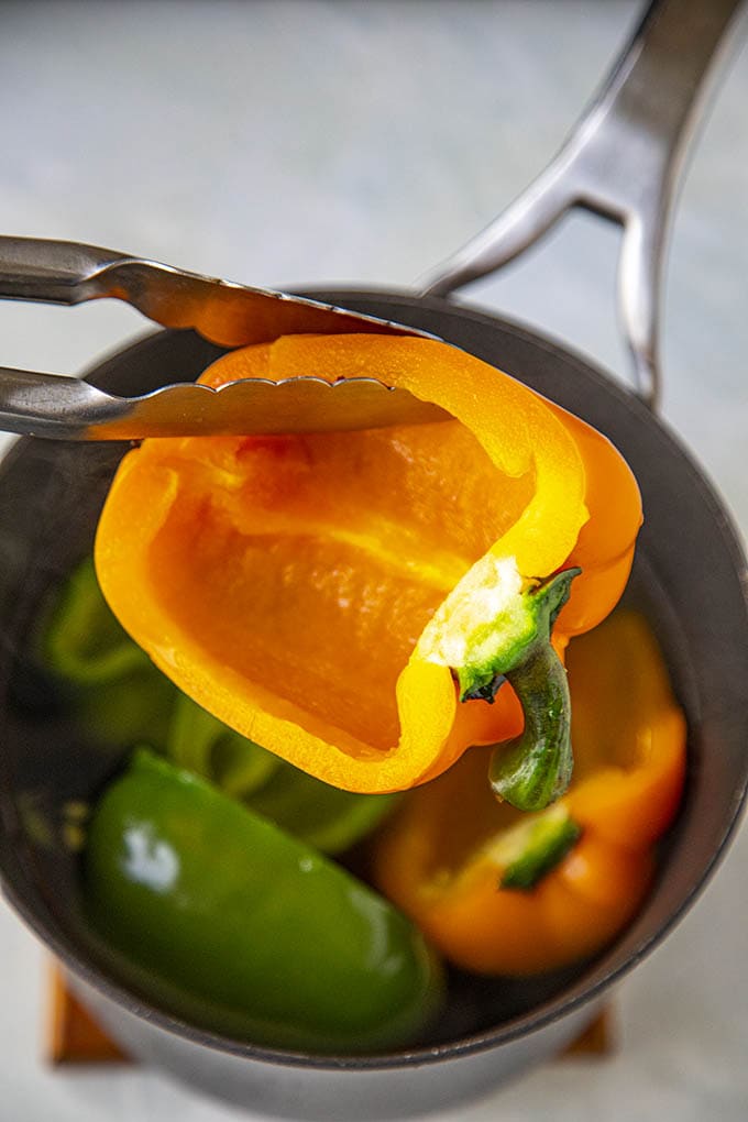 Softening the bell peppers in boiling water