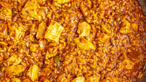 Fluffy seasoned rice and chicken for stuffing our peppers