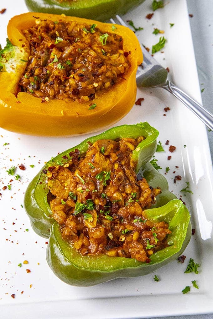 Chicken and Rice Stuffed Peppers close up on a platter with a fork