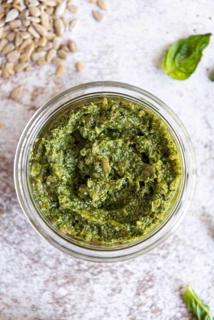 a jar of pesto made with sunflower seeds