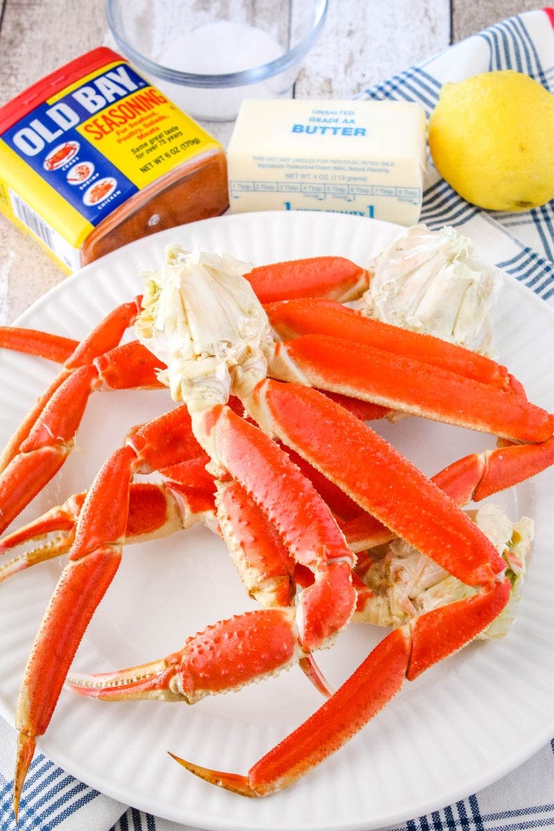 Making crab legs is easier than you think! Ready in only 5 minutes, these crab legs are the best way to treat yourself to a fancy meal at home! ingredients to make boiled snow crab legs