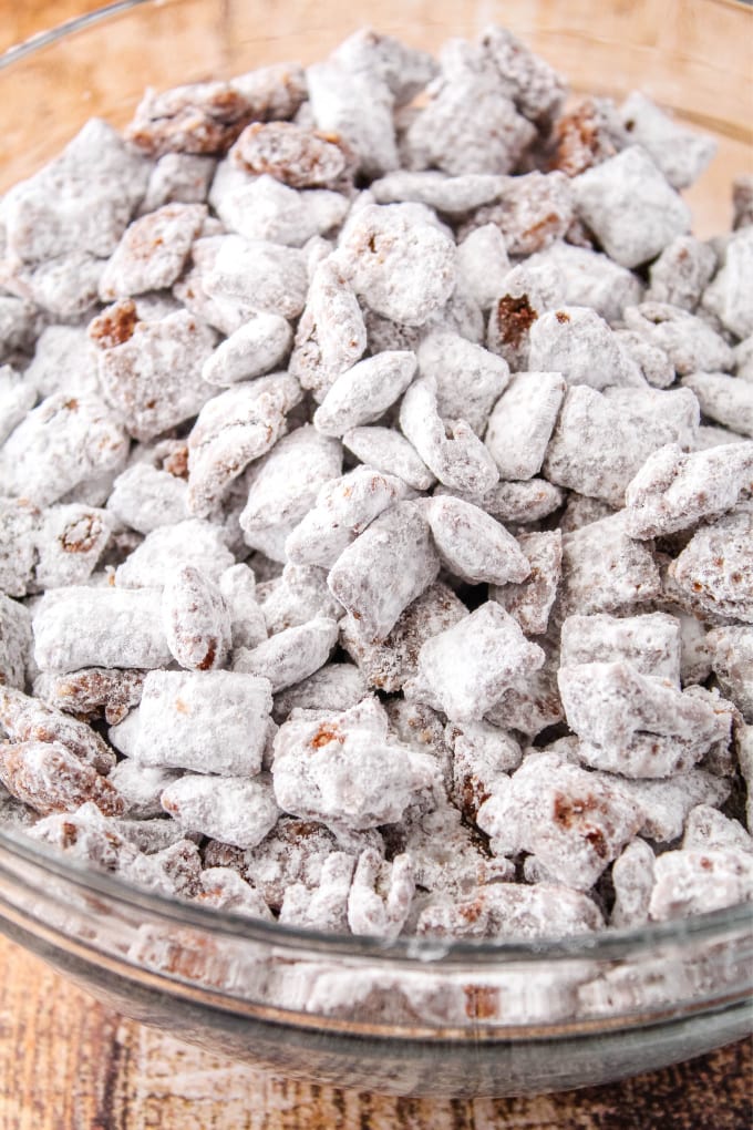 muddy buddies in a glass bowl after shaking