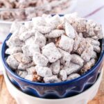 square image of muddy buddies in a bowl