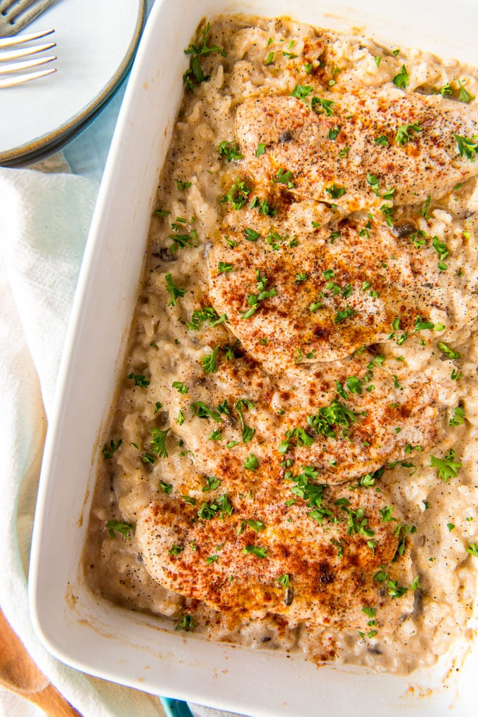 Casserole dish with chicken, rice, and parsley