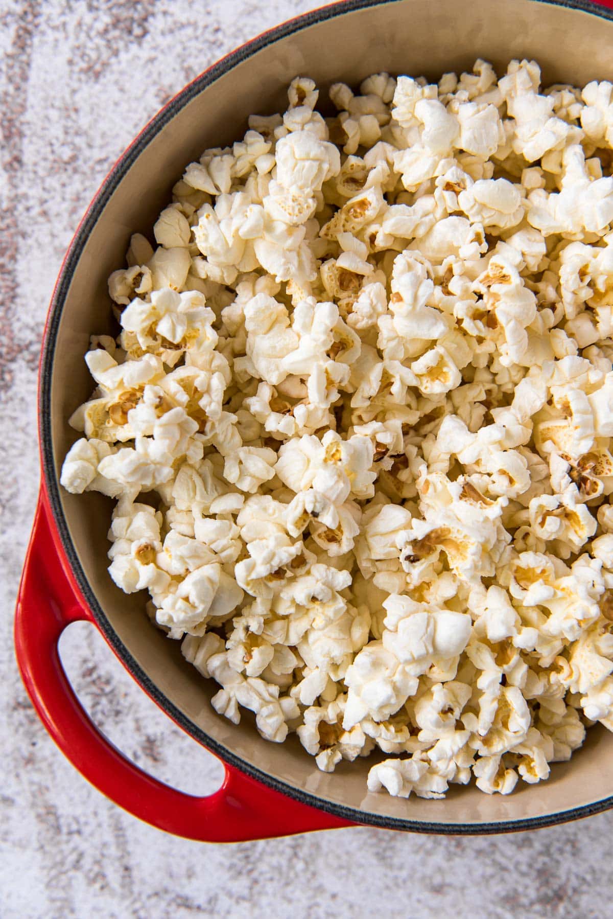 Popcorn in a red pot.