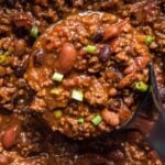 beef chili, ladle, green onions