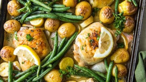large sheet pan chicken, potatoes, green beans, lemons, garlic, onions