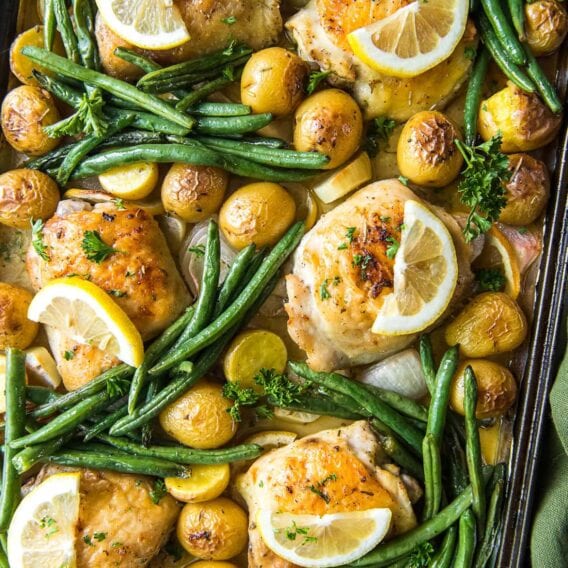 sheet pan chicken thighs, potatoes, green beans and lemons