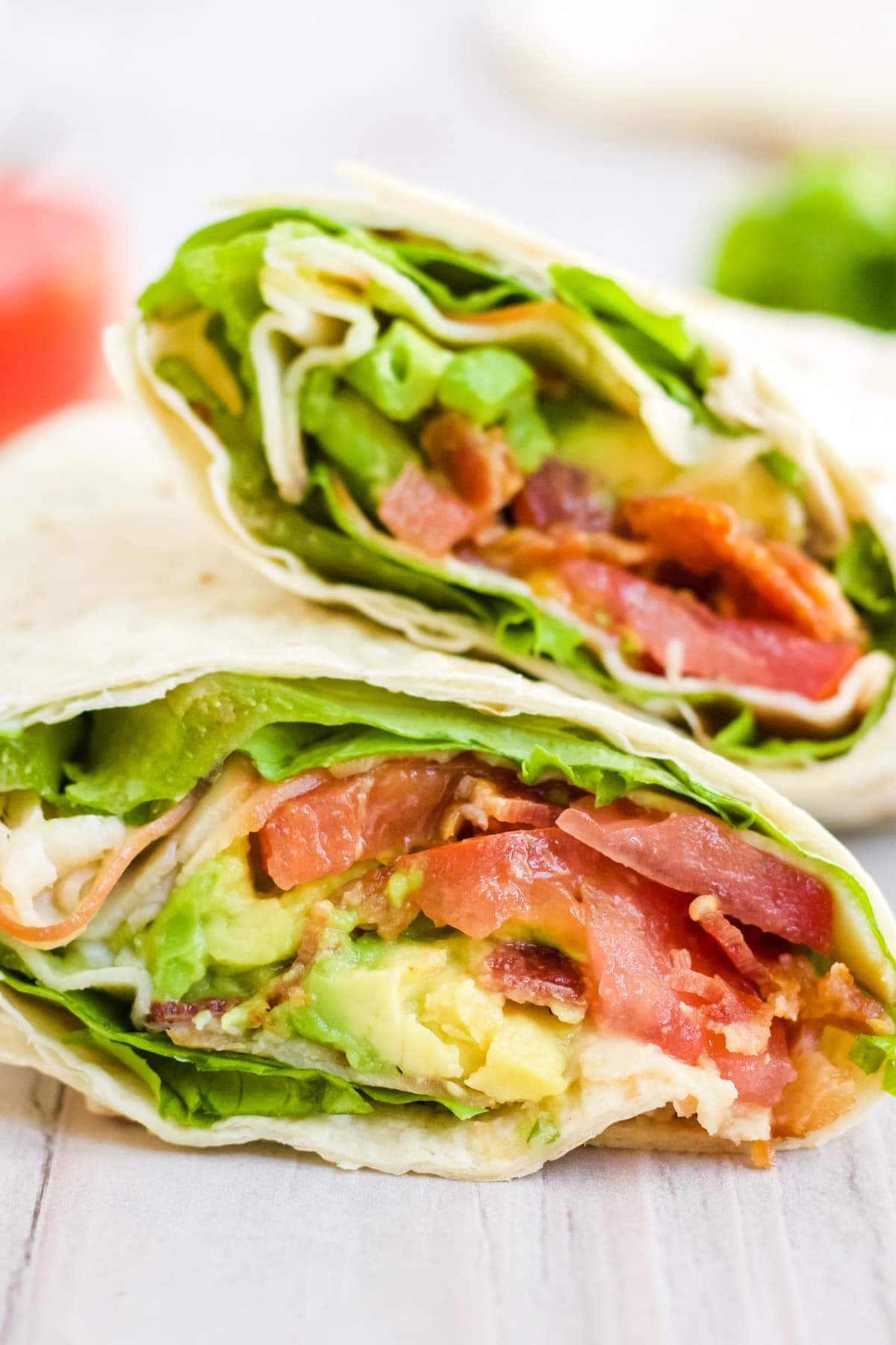 A close up image of a finished turkey BLT wrap