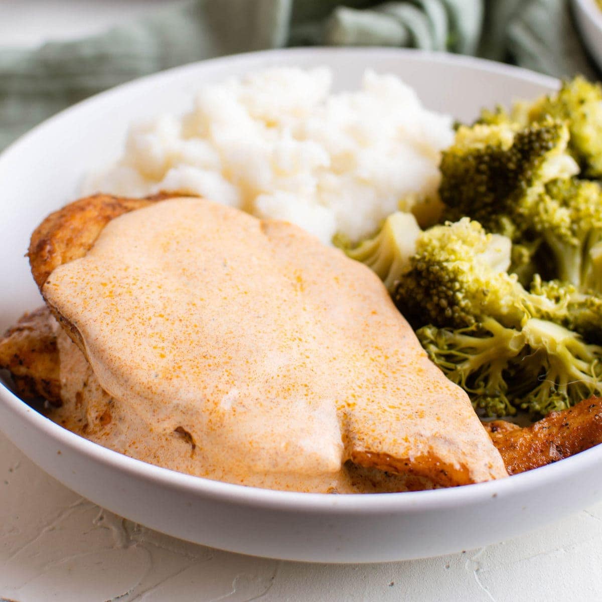 chicken breasts, mustard sauce, broccoli, mashed potatoed