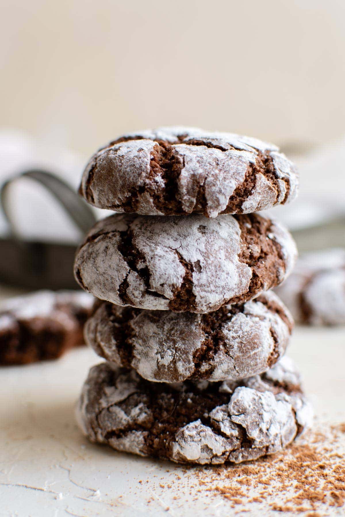 stack of chocolate cookies with powdered sugar