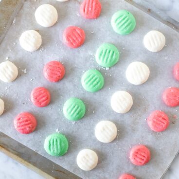 Cookie sheet of cream cheese candies.