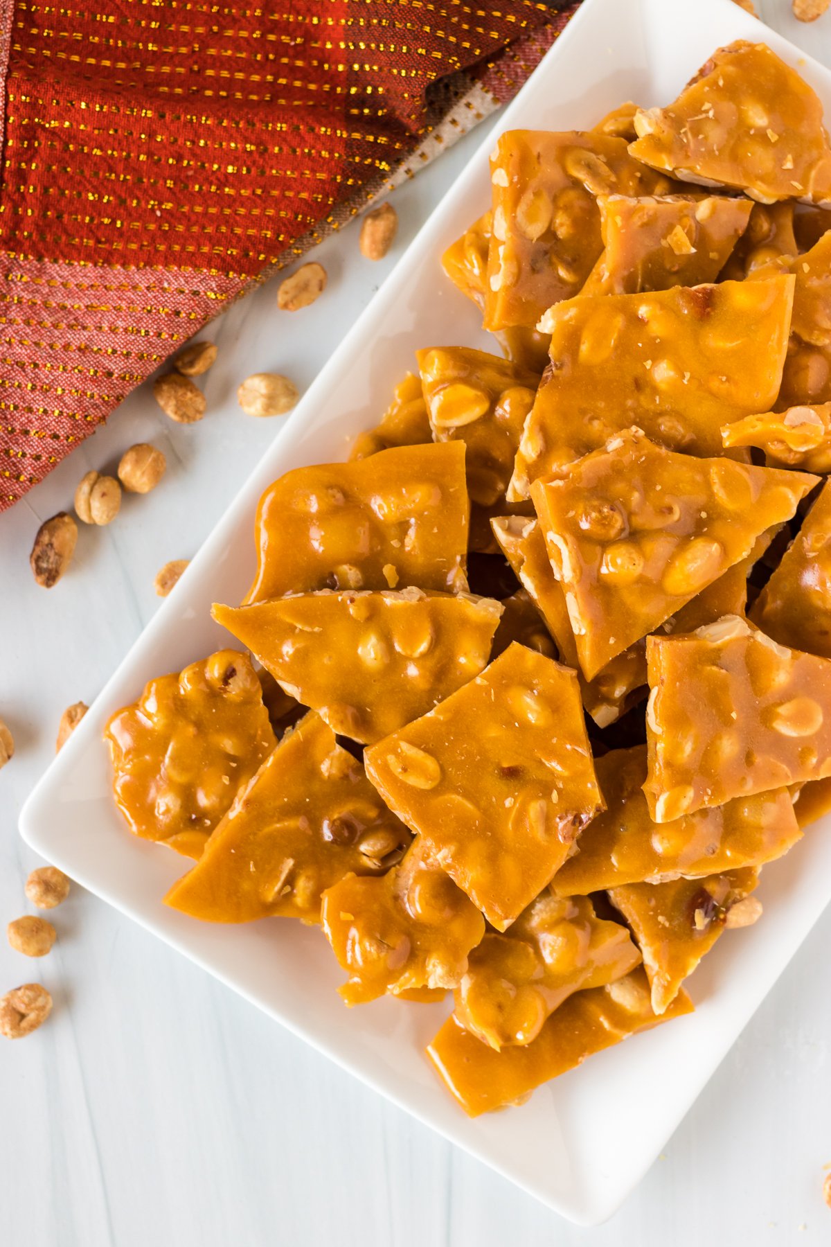 white platter of peanut brittle