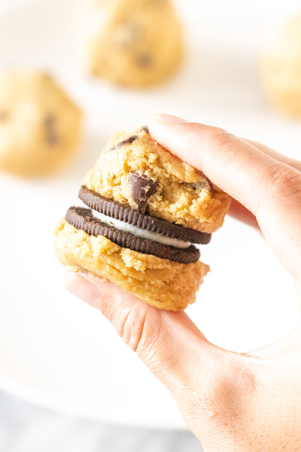 Making chocolate chip cookies with an Oreo inside