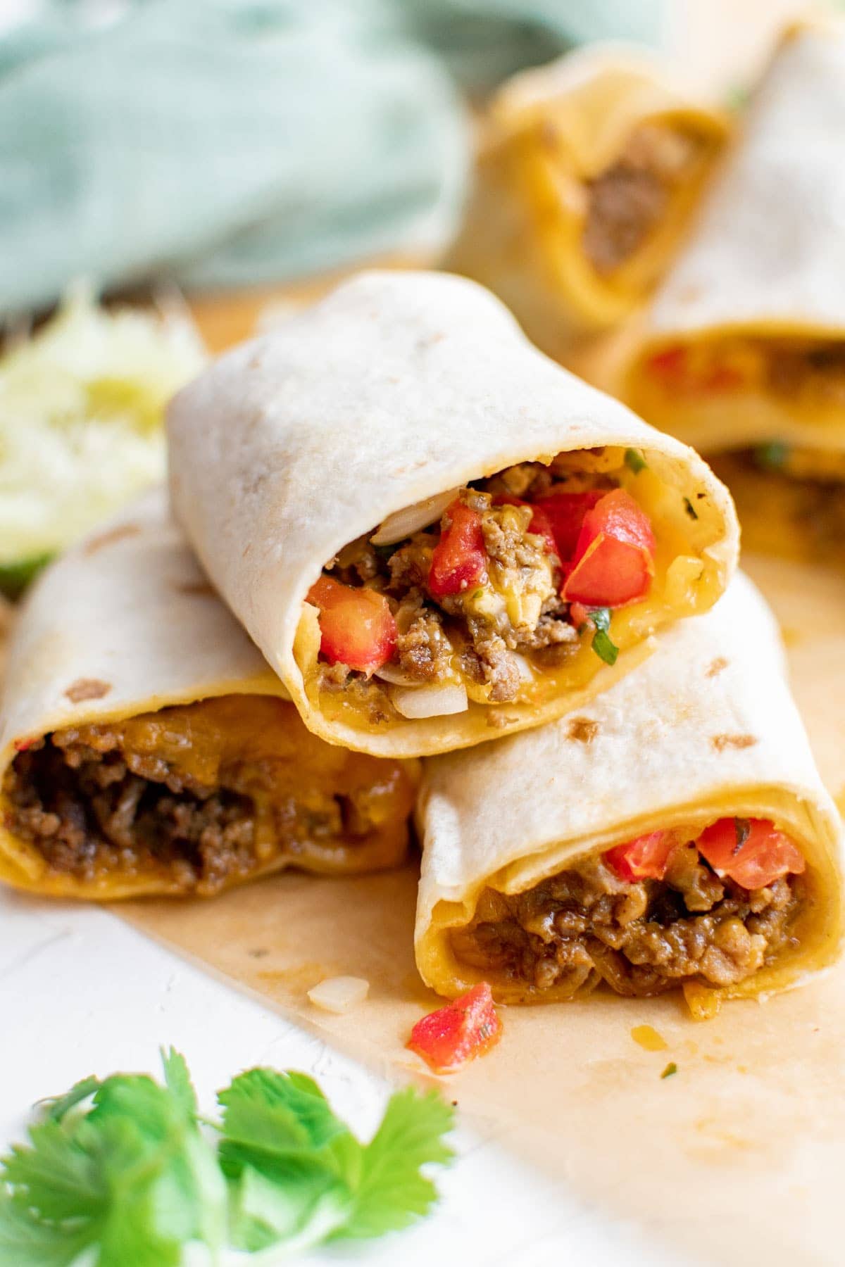 Meximelts with cheese, beef and tomatoe salsa in flour tortillas