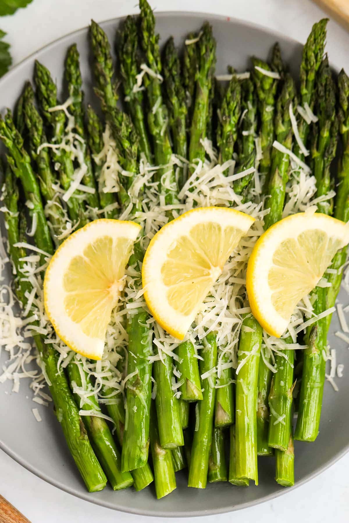 plated asparagus with lemon and parmesan