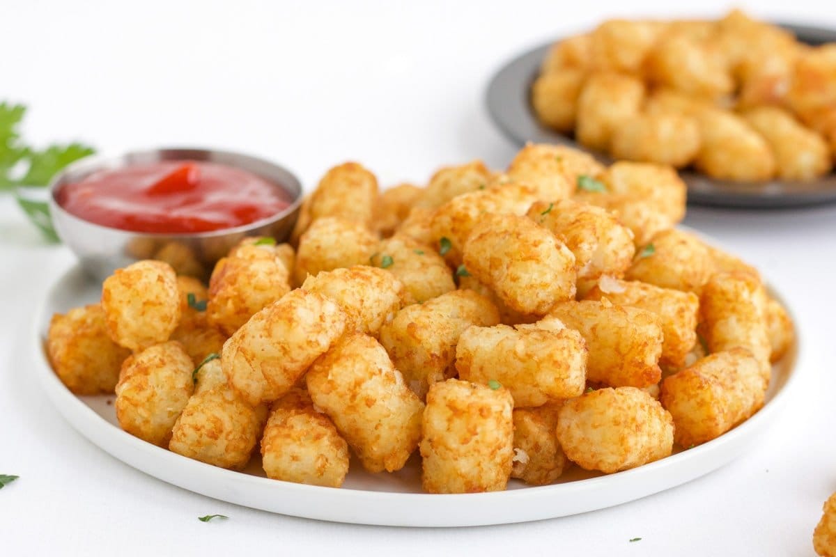 platter of tater tots, ketchup, parsley