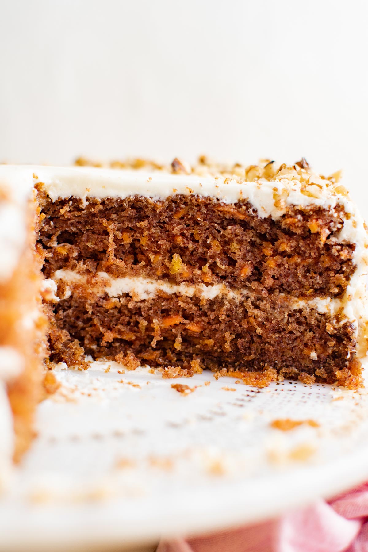 inside of a carrot cake on a white platter