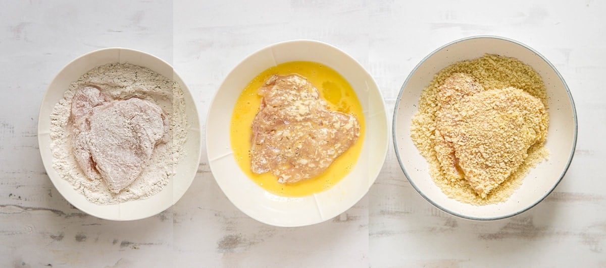 bowls with flour, eggs and breading for fried chicken