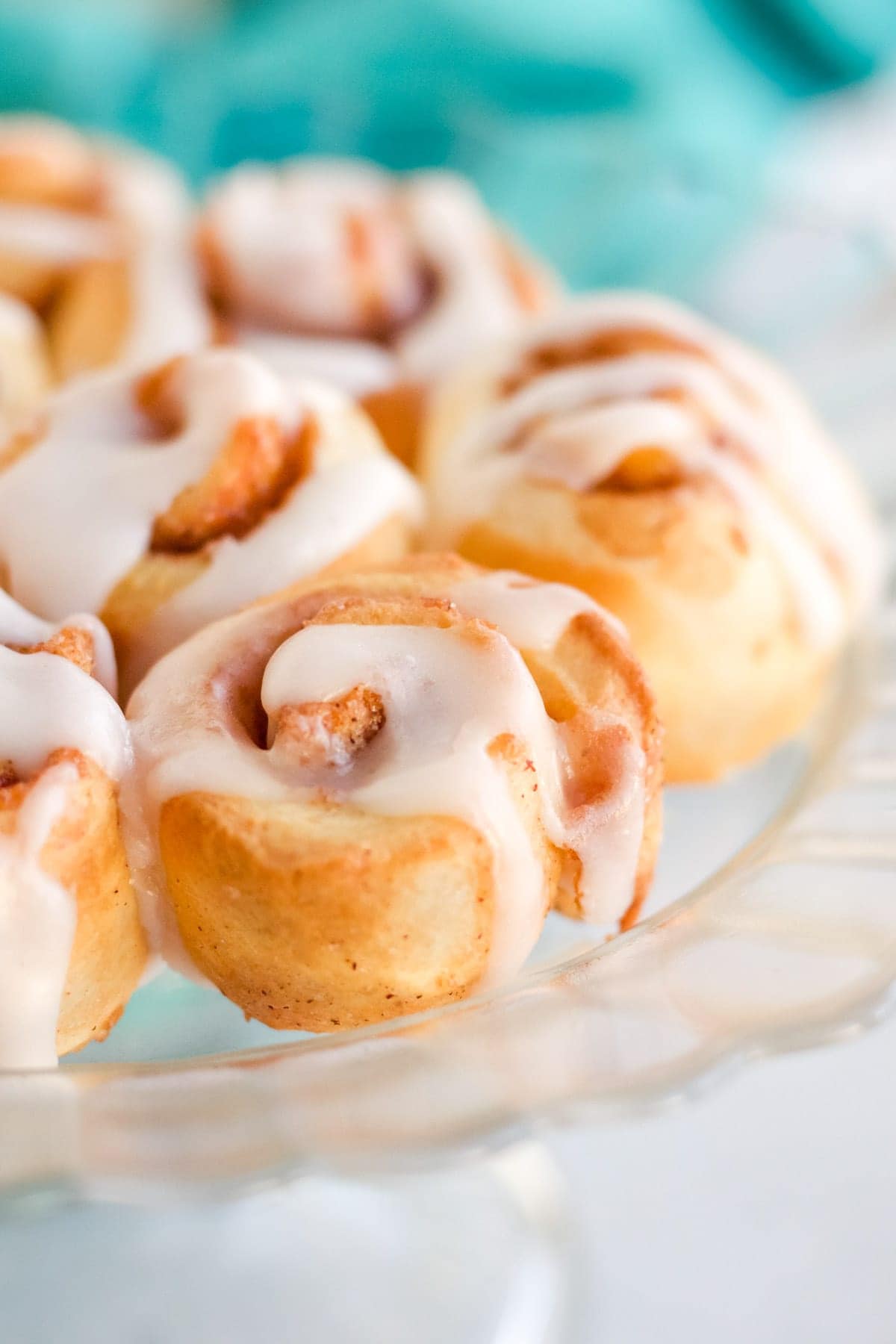 mini cinnamon rolls on a glass platter