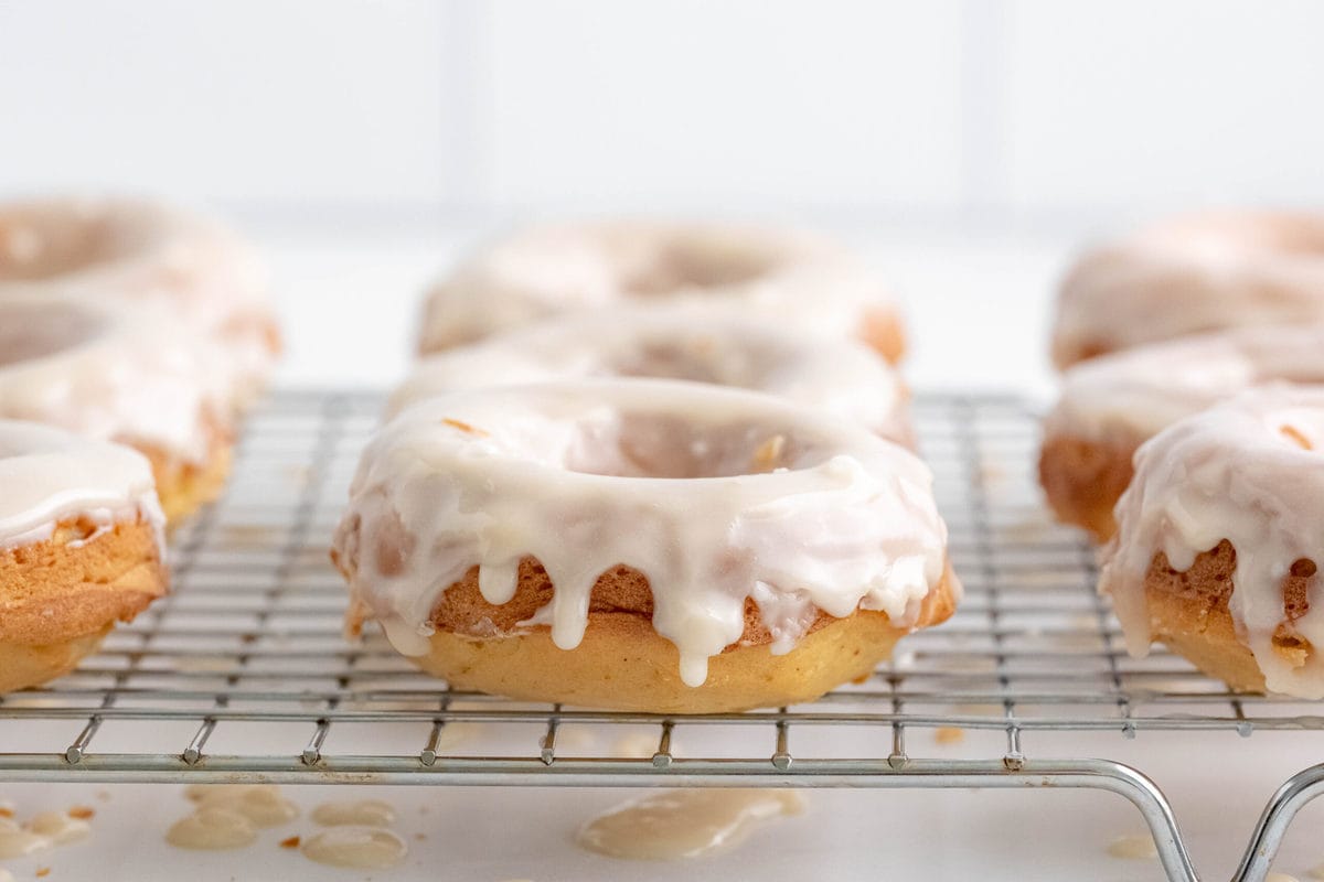 baked glazed donuts on a wire rack