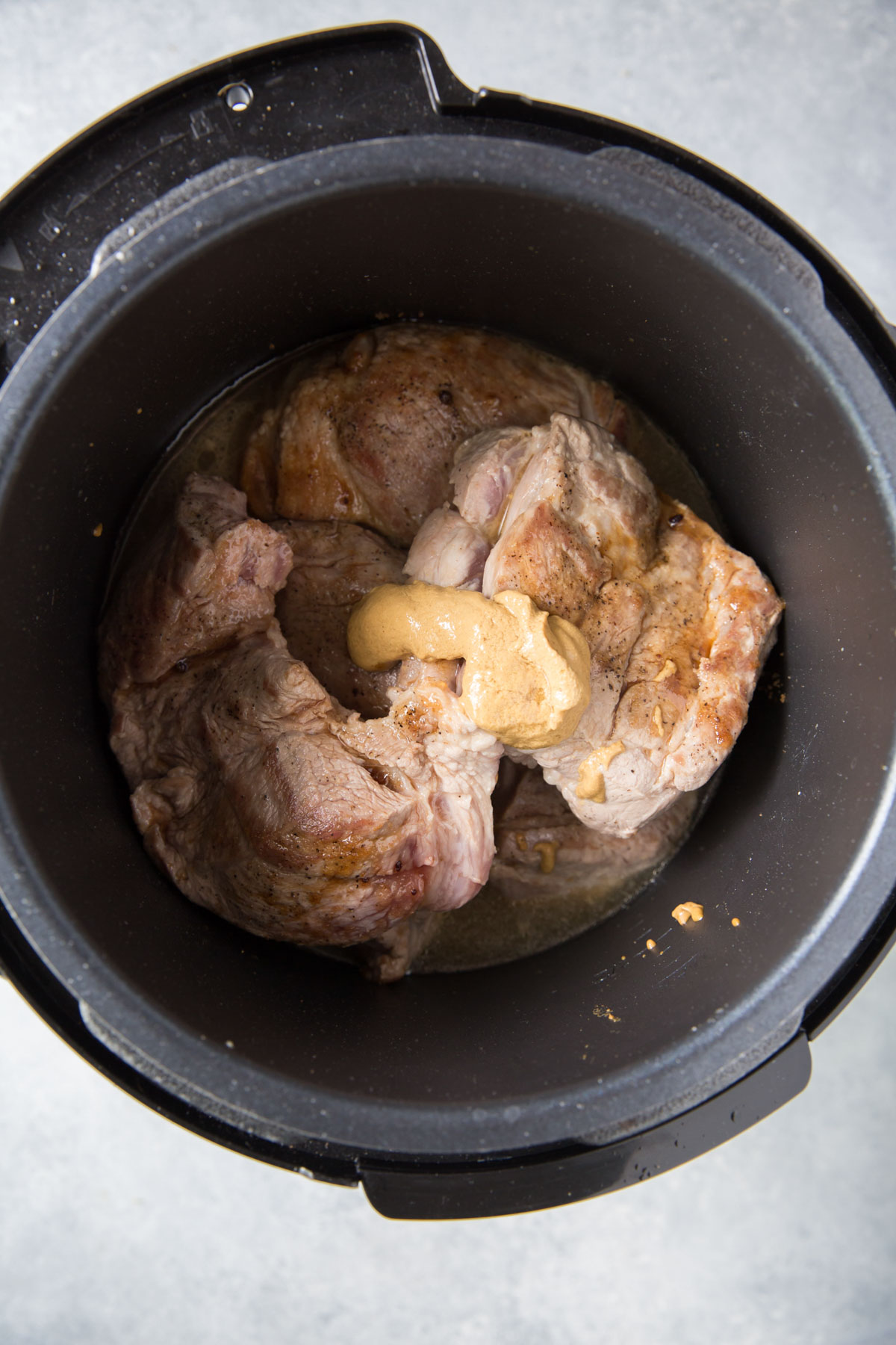 instant pot with pork, mustard and liquid