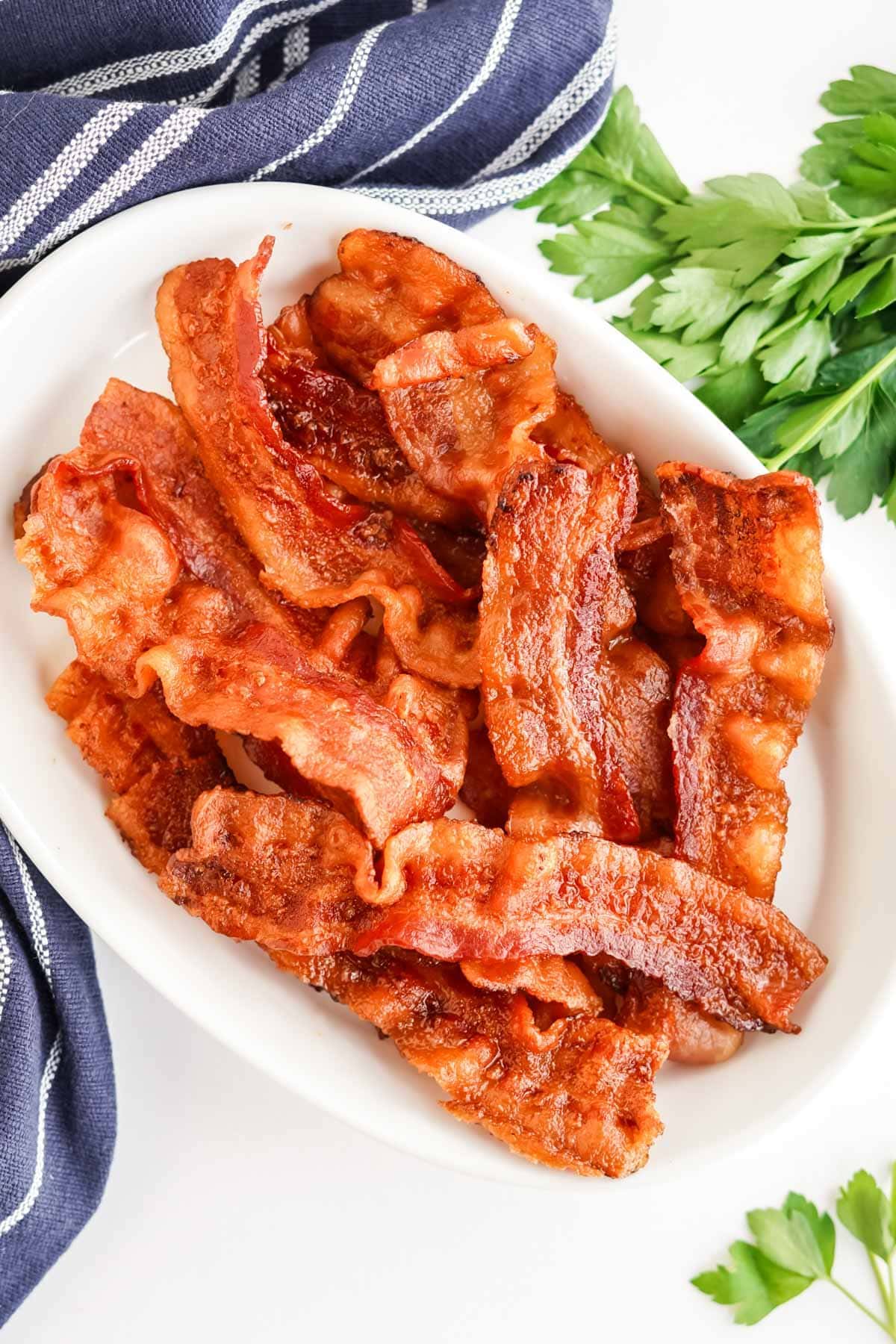 air fryer bacon on white plste