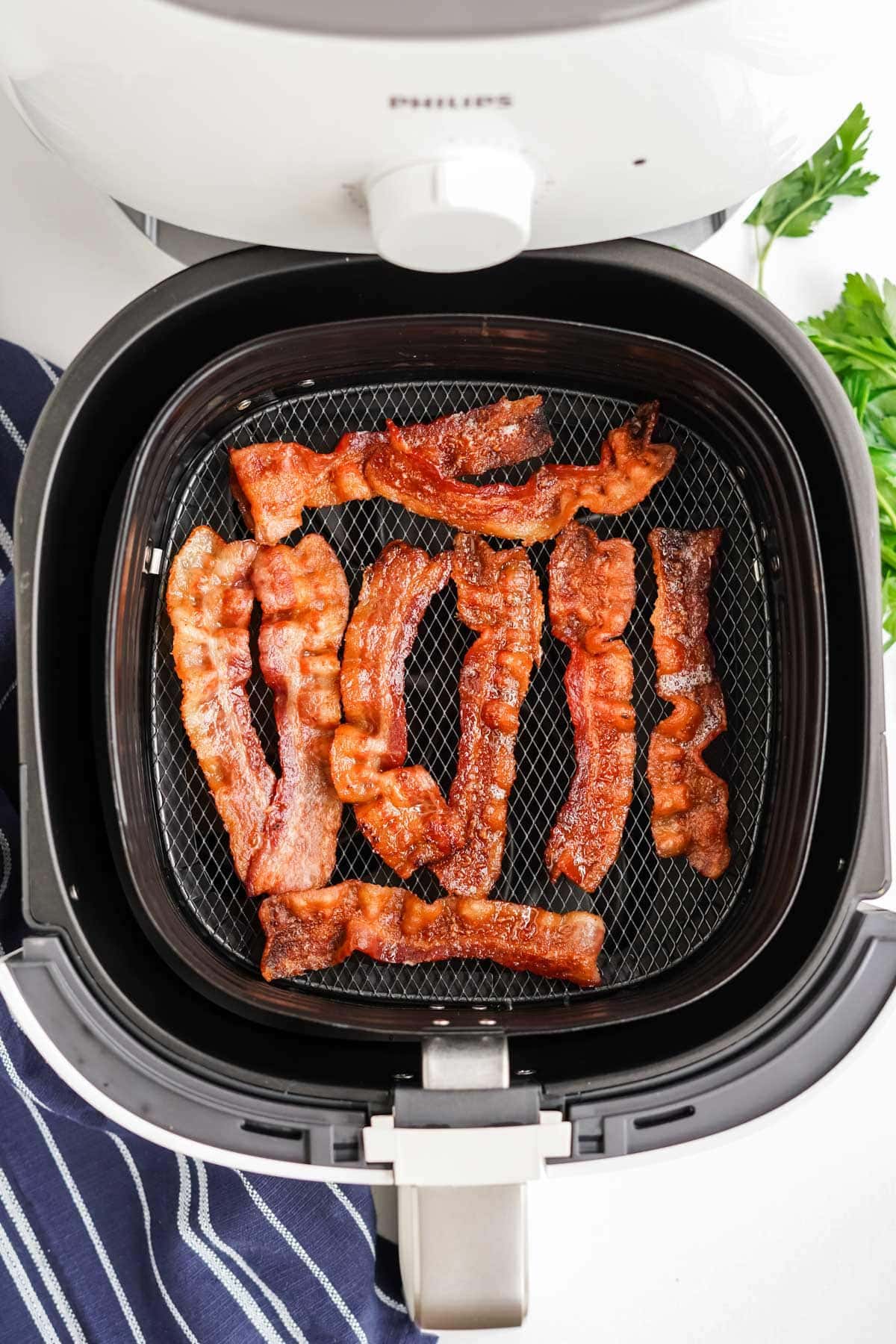 cooked bacon in air fryer basket