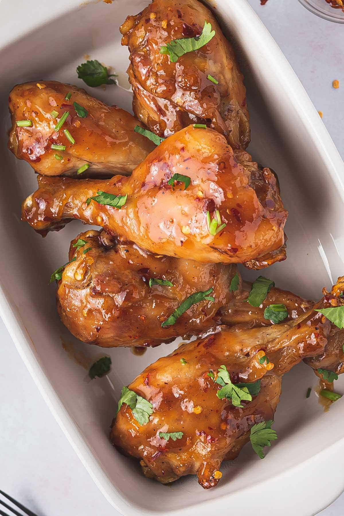 air fryer Chicken Drumsticks served on a white pan