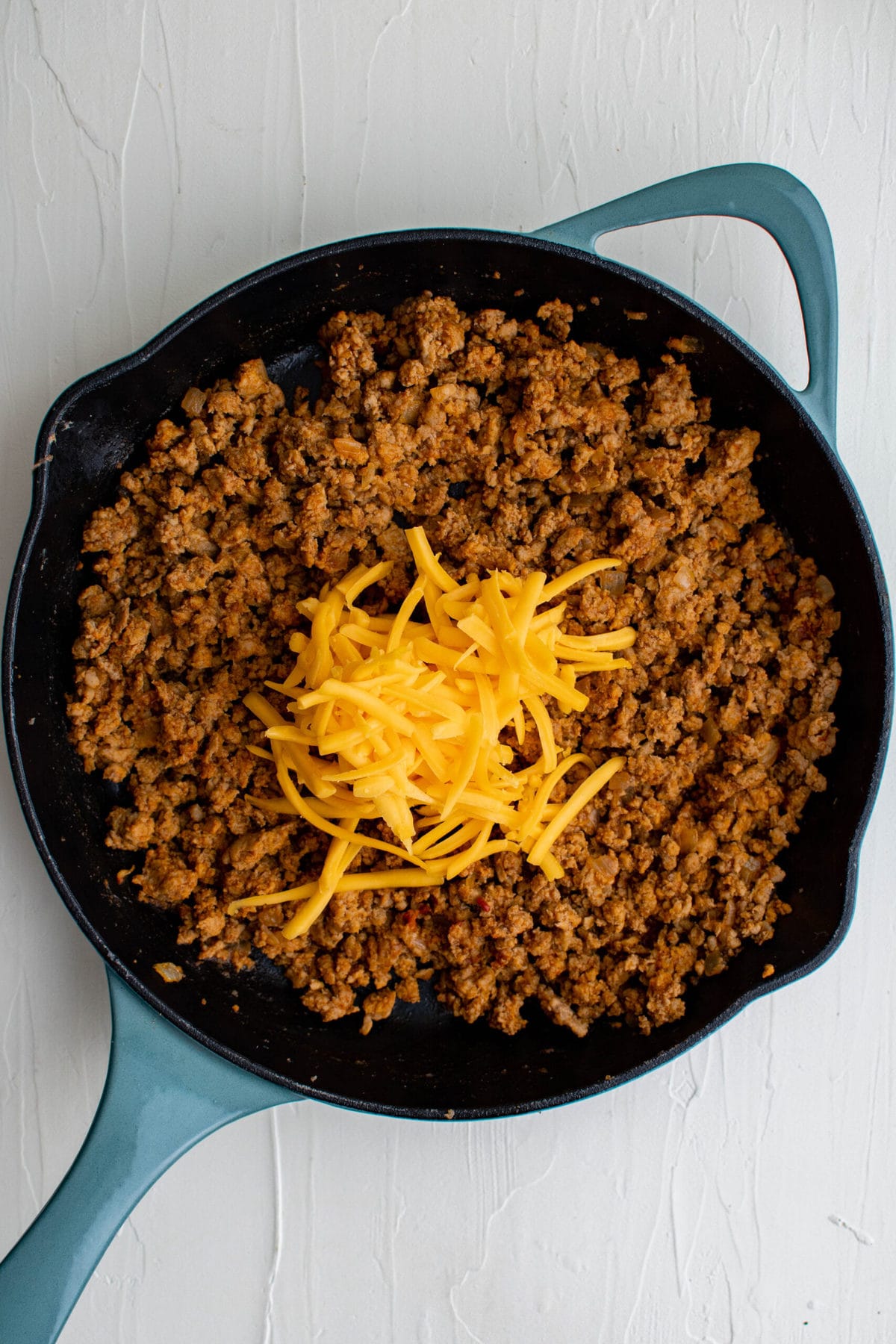 ground turkey seasoned taco meat in a skillet