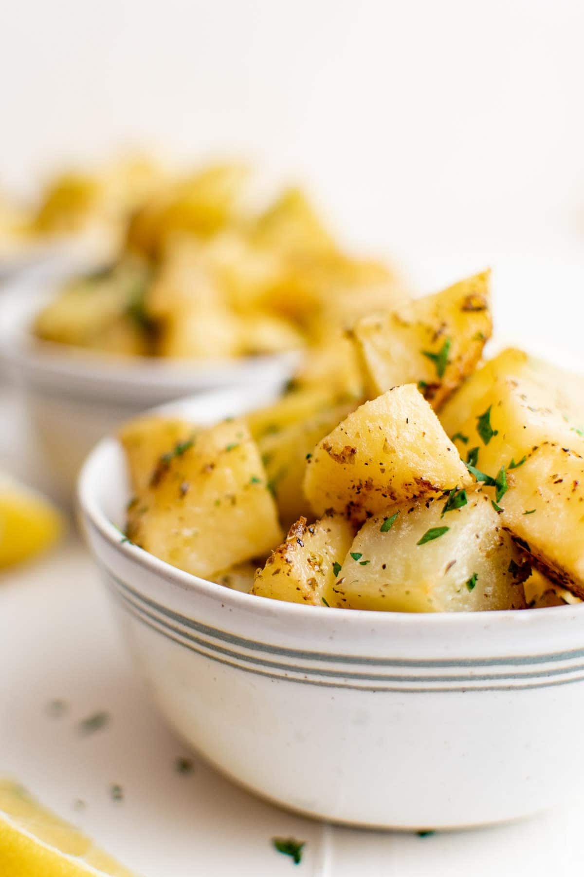 white bowl, crispy potatoes 