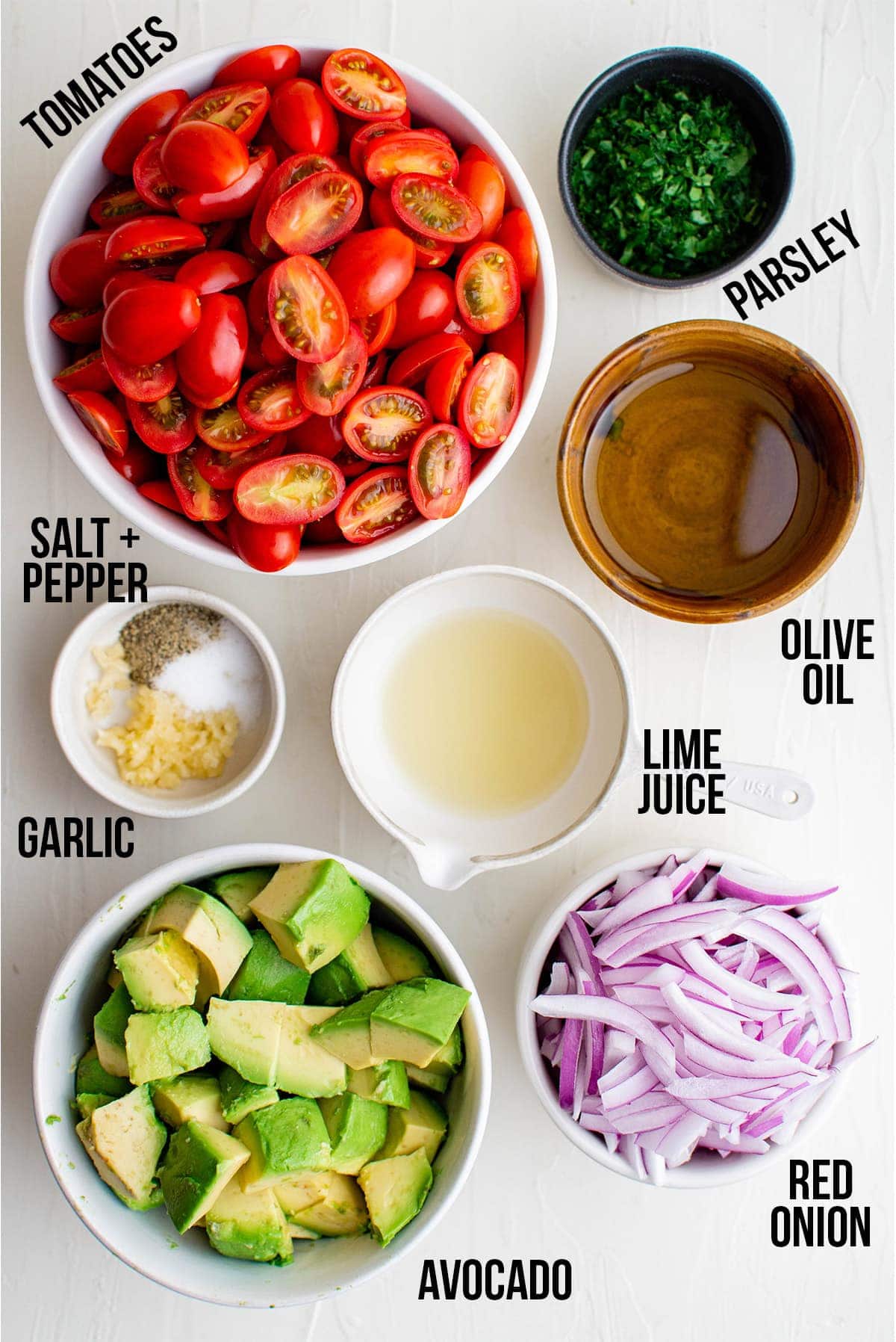 Ingredients for tomato and avocado salad