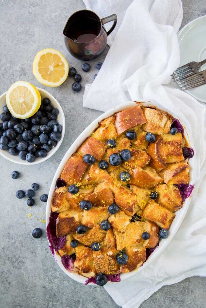 French toast casserole with blueberries, lemon, white towel