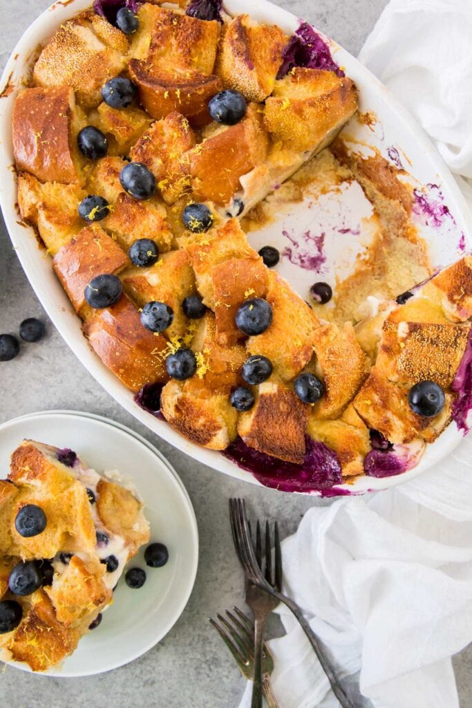 blueberry french toast casserole, a square piece o a white plate.