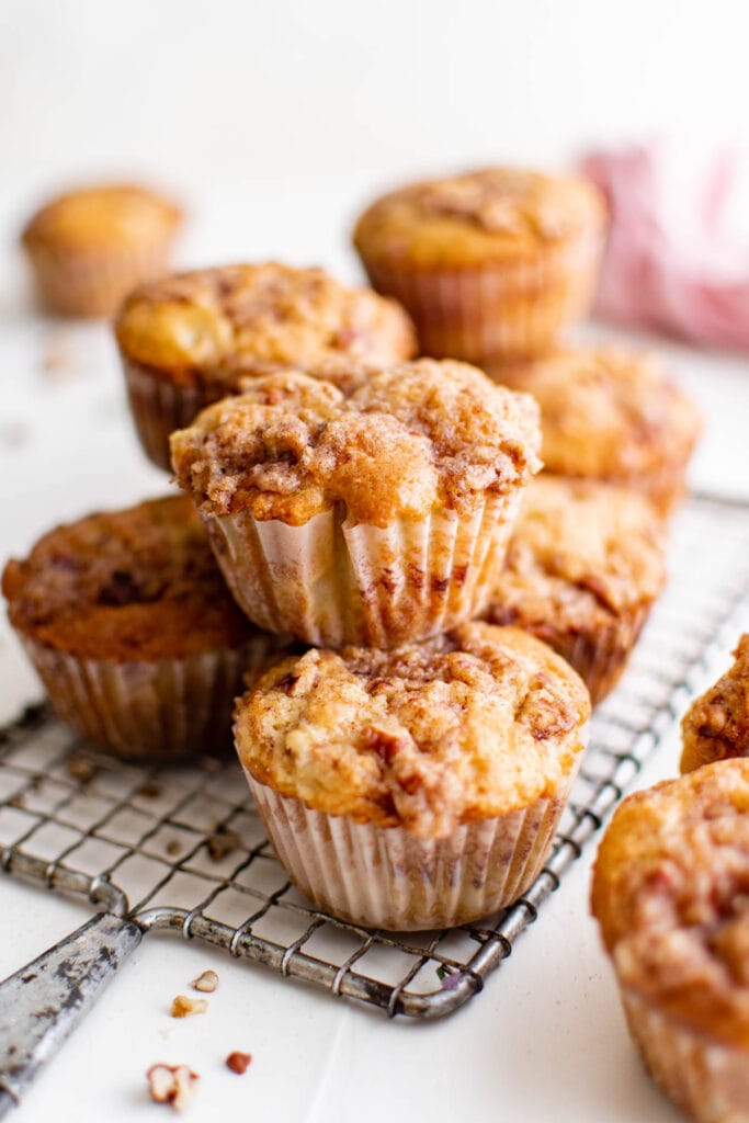 stack of rhubarb muffins on a small wire rack