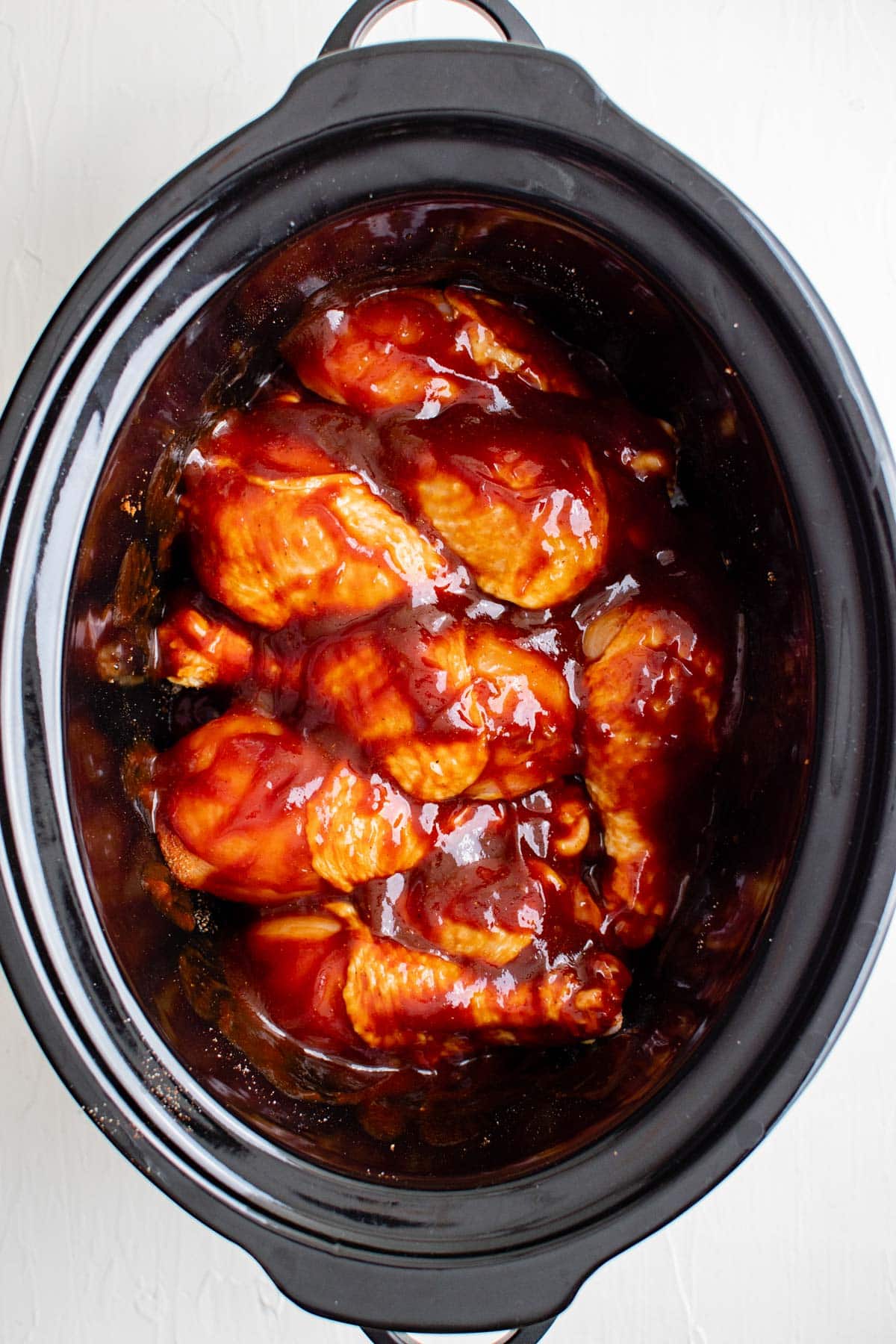 drumsticks in a slow cooker with bbq sauce