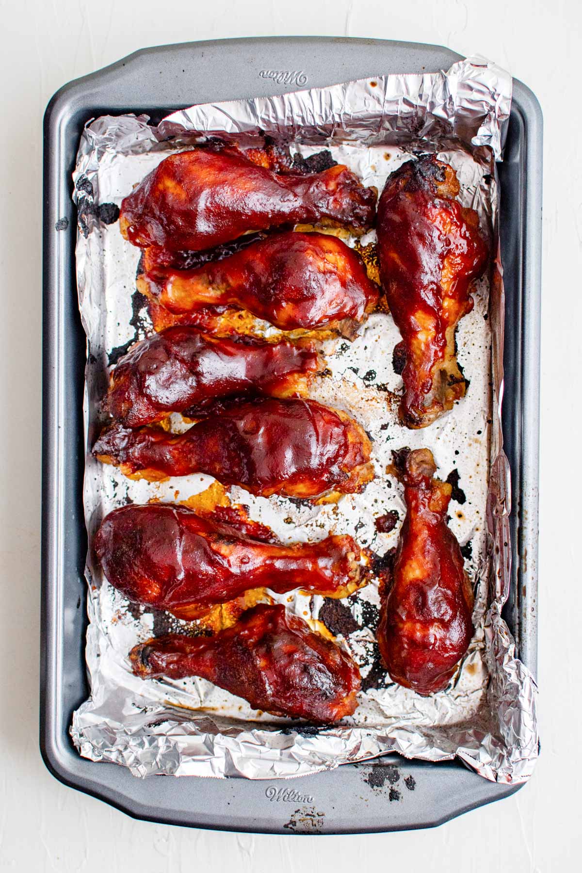 sheet pan with foil, chicken drumsticks with bbq sauce