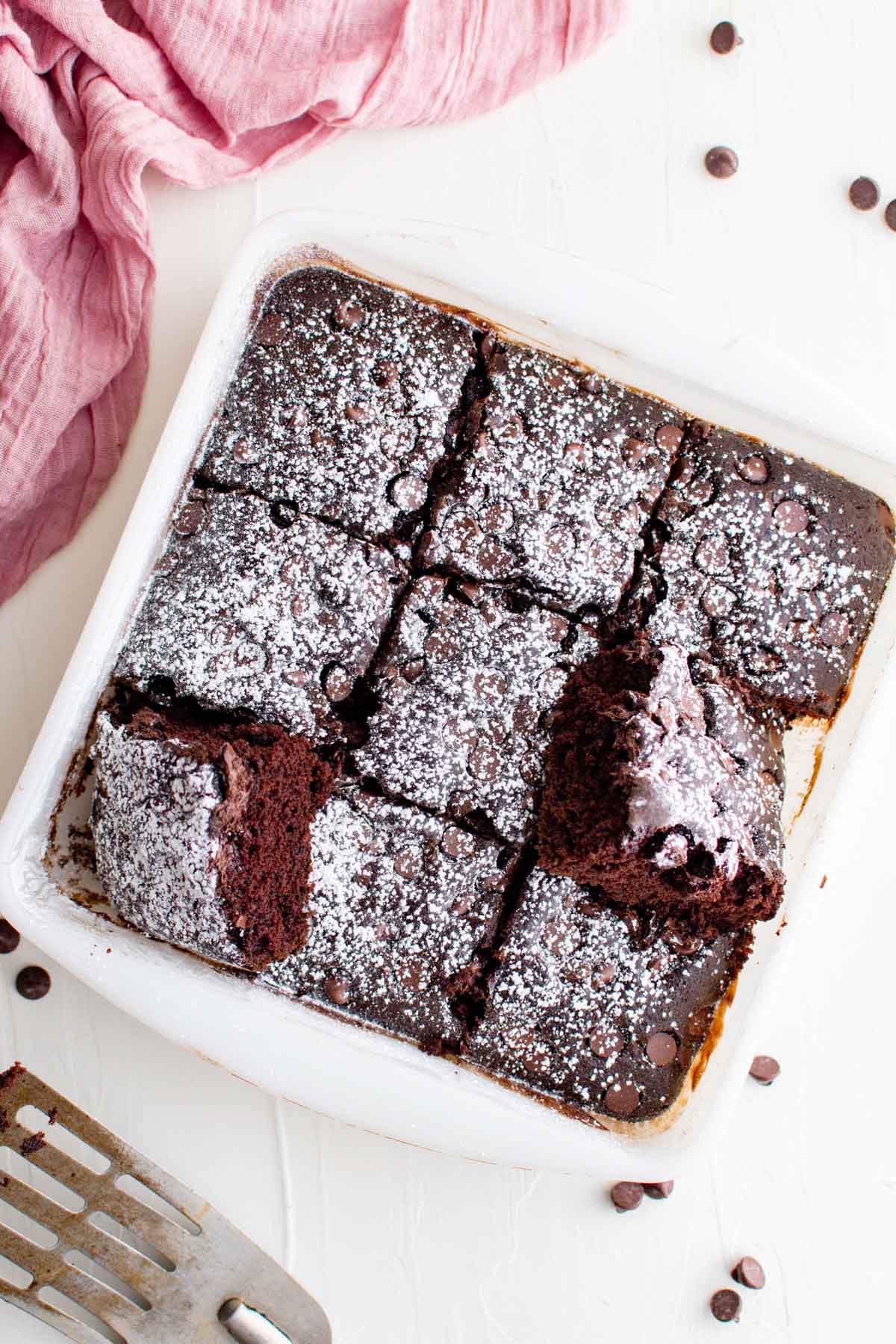 chocolate cake, sliced in a baking dish