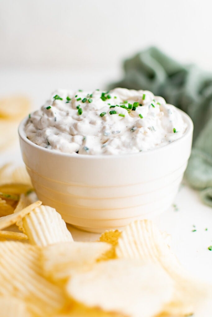 french onion dip in a bowl with chips