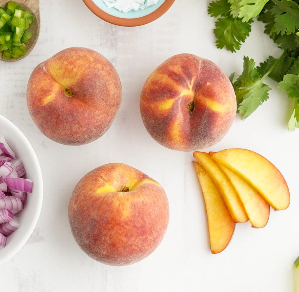 peaches, both whole and slicecd,