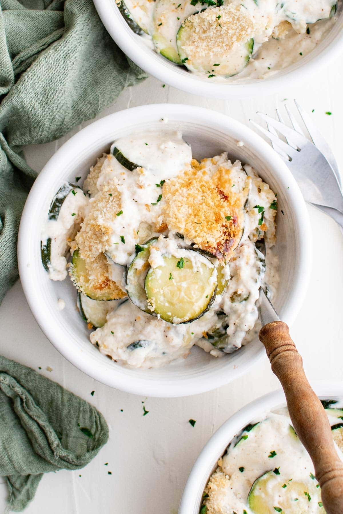 creamy cheesy zucchini casserole with breadcrumbs