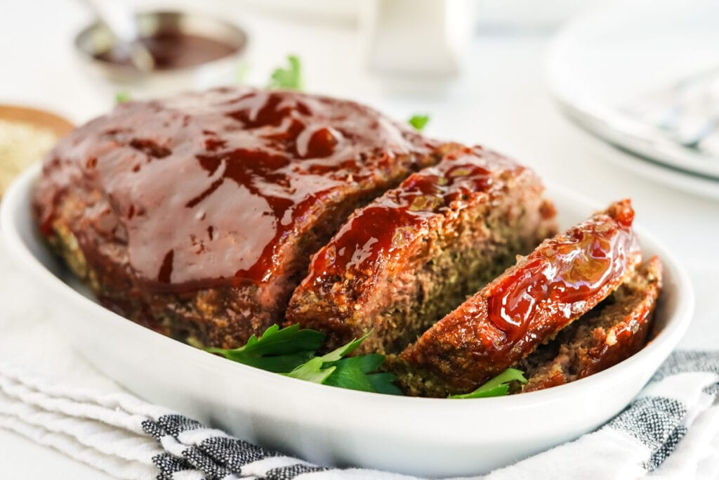 Meatloaf with tomato ketchup glaze and 2 slices.