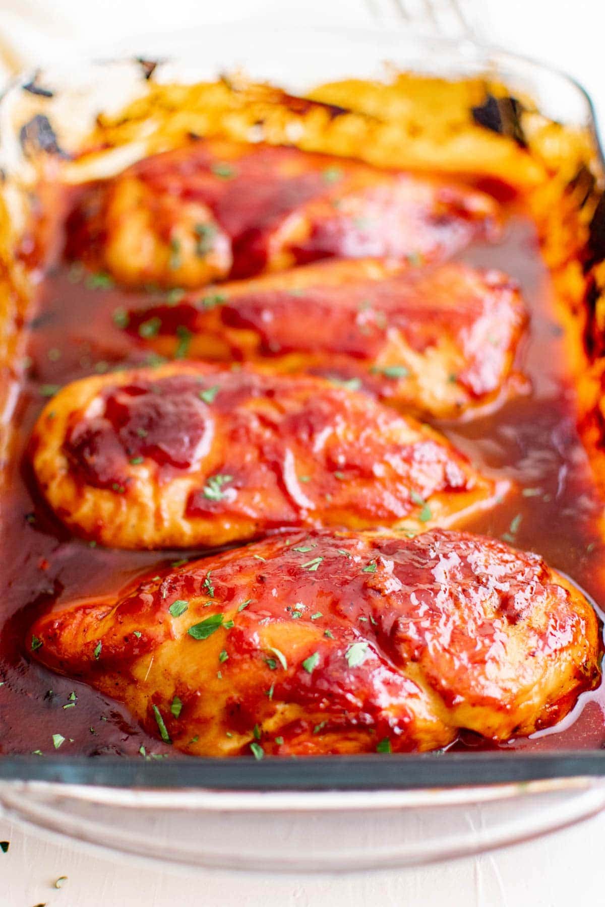 baked bbq chicken in a baking dish