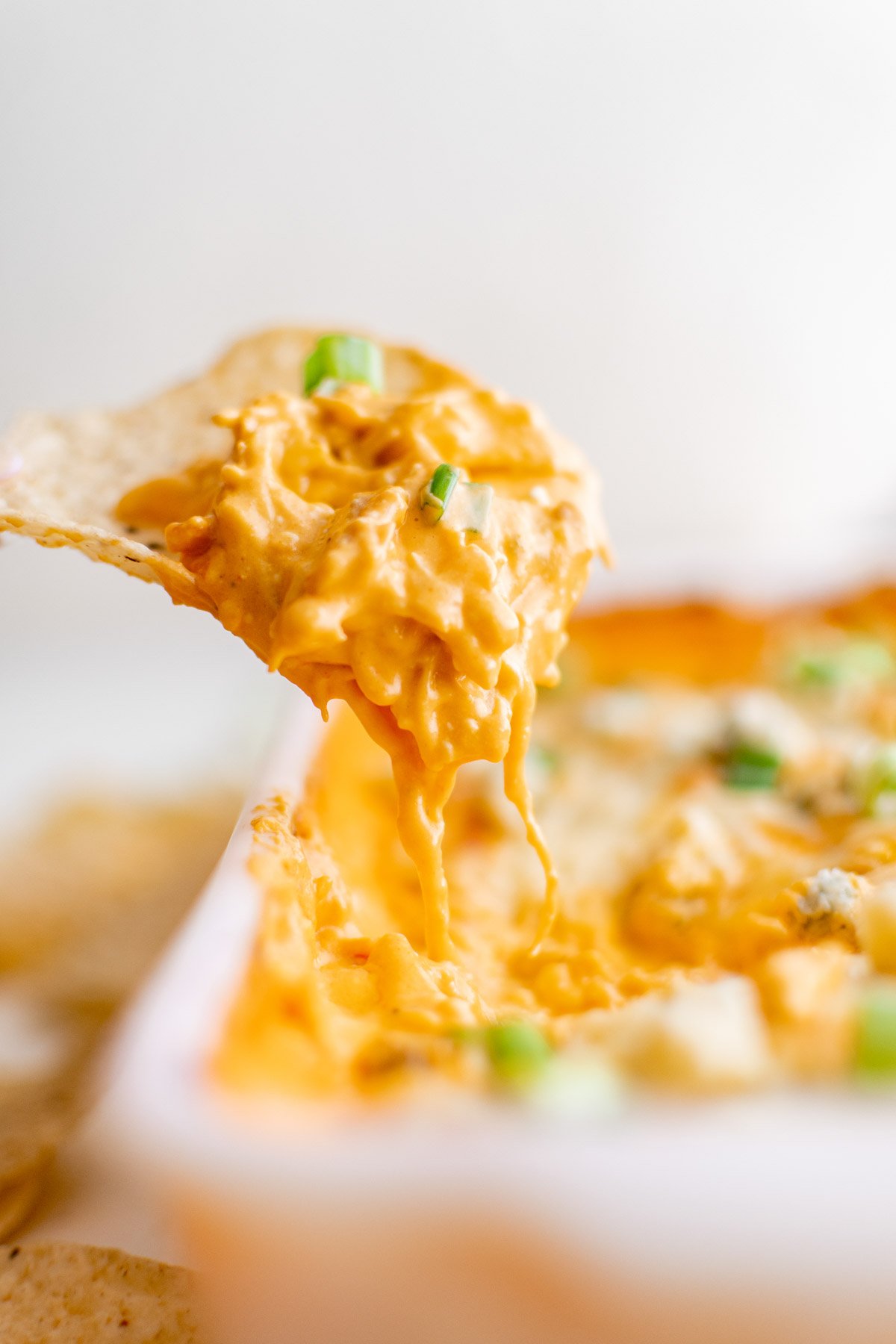 spoon scooping out chicken dip