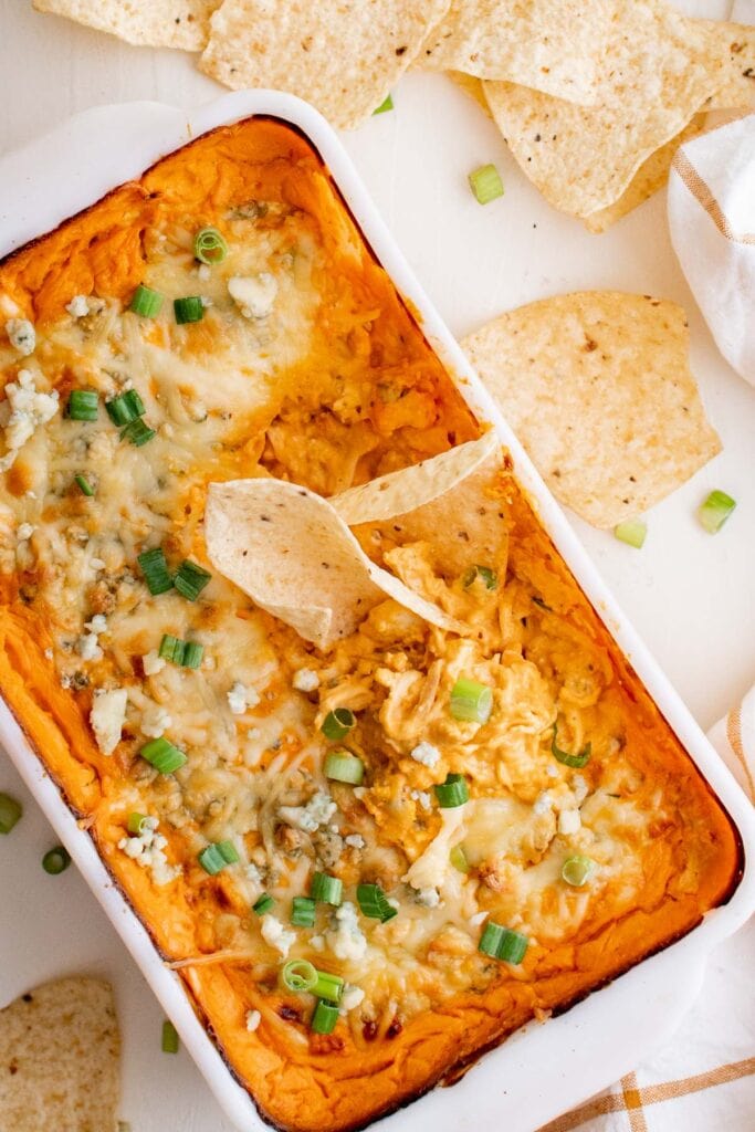 chicken dip with buffalo sauce in a large casserole dish
